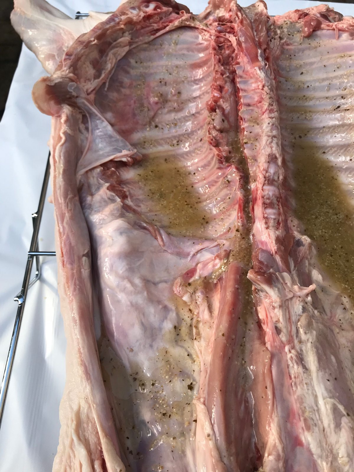 Close view of the opened hog during preparation